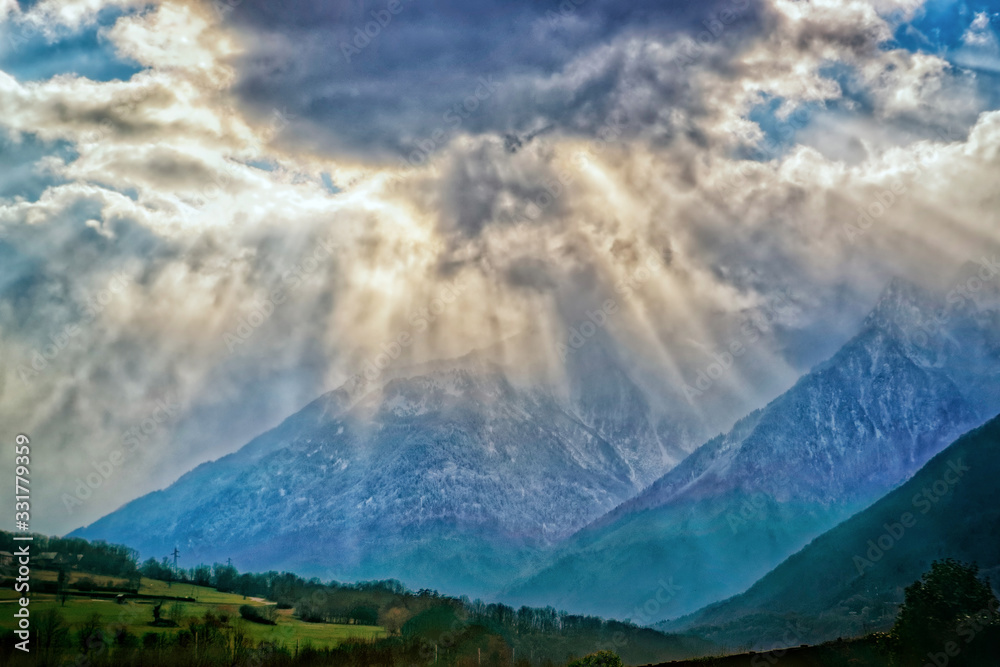 Spectacular sun rays  in french alps