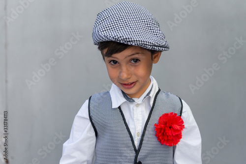 boy with a chulapo cap in san isidro madrid photo