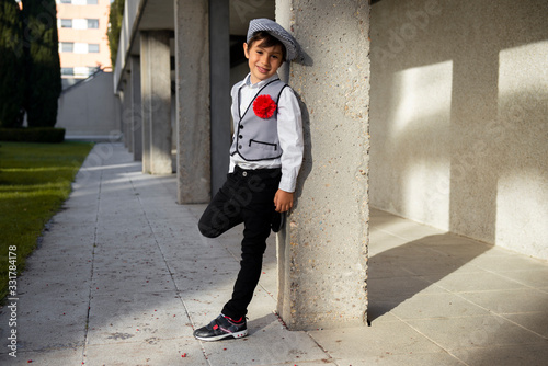 boy with a chulapo cap in san isidro madrid photo