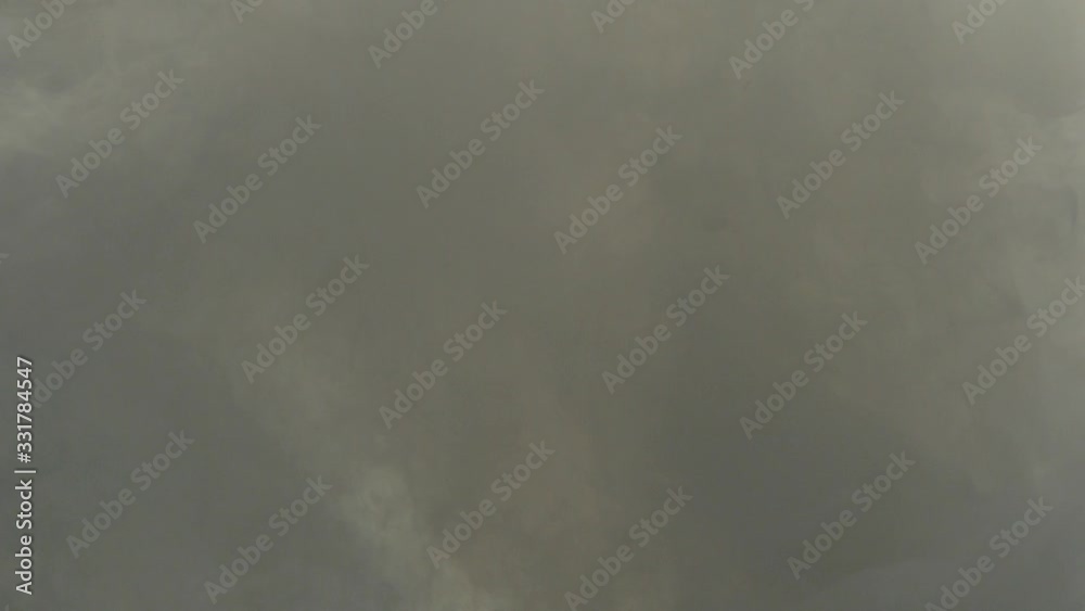 Gray smoke swirls and rises. Fire in the forest. Gray smoke swirls and rises. Fire in the forest.