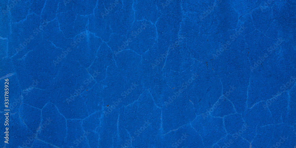 Grunge blue classic concrete cement wall with crack texture background Grunge blue classic concrete cement wall with crack texture background