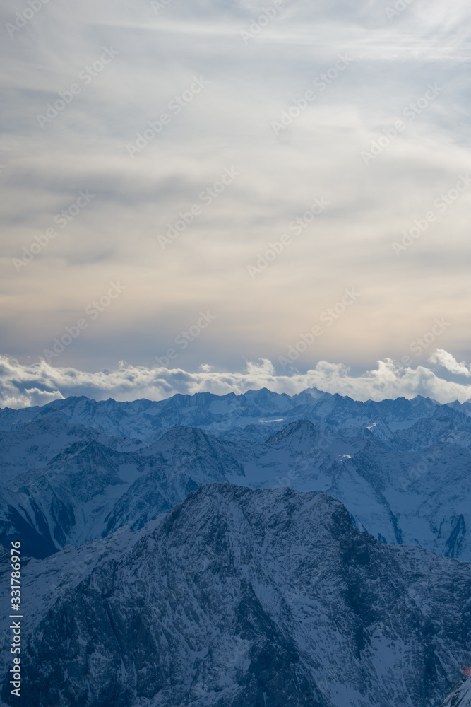 High alpine mountains with snow in Germany and blue beautiful sky High alpine mountains with snow in Germany and blue beautiful sky