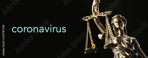 coronavirus covid-19 and Statue of Justice - law concept