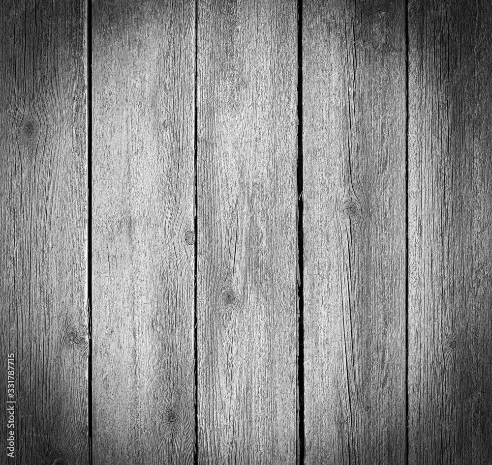 Naklejka premium Old gray wooden board background.