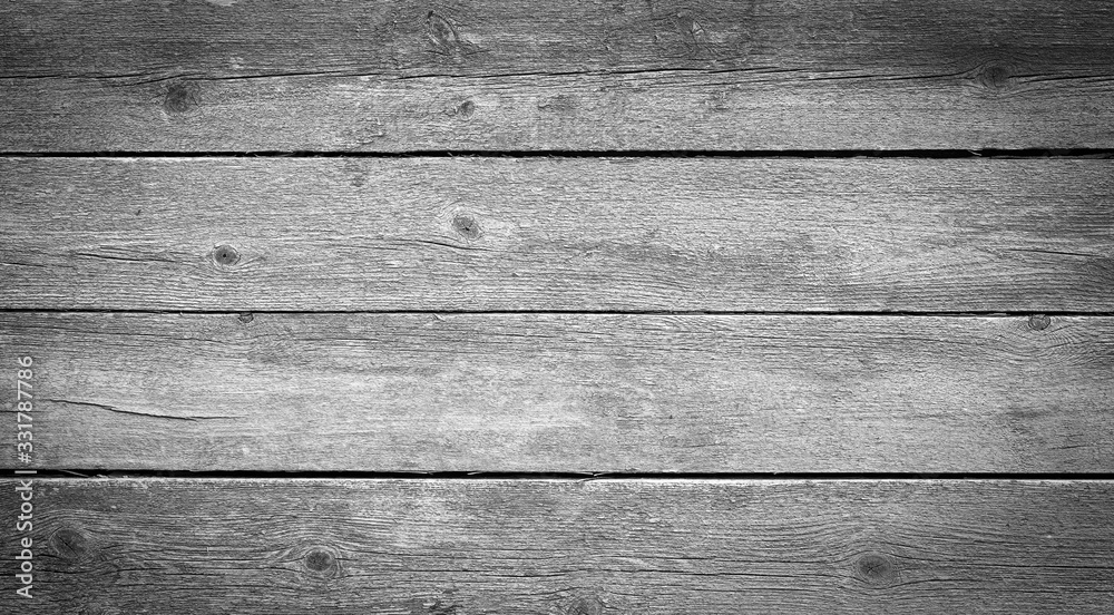 Naklejka premium Old gray wooden board background.