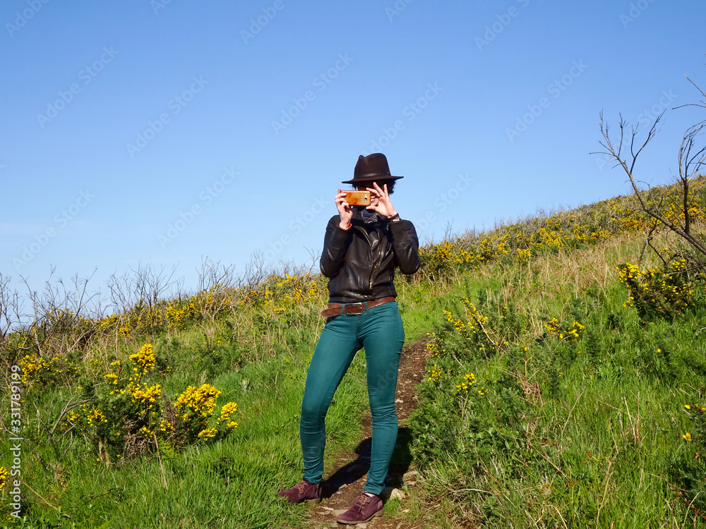 beautiful woman taking a picture beautiful woman taking a picture