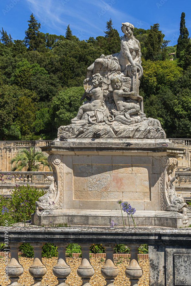 Obraz premium Remarkable garden and first public garden in Europe: Jardin de la Fontaine (1738 - 1755) in Nimes. Nimes, Occitanie region of southern France.