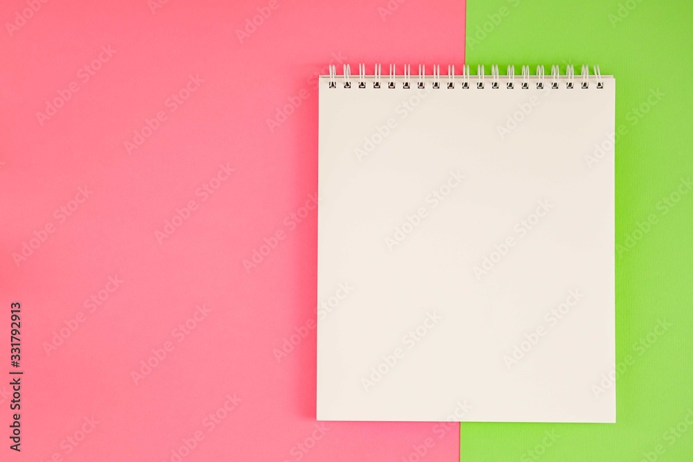 Blank notepad on bright background. Blank notepad on bright background.