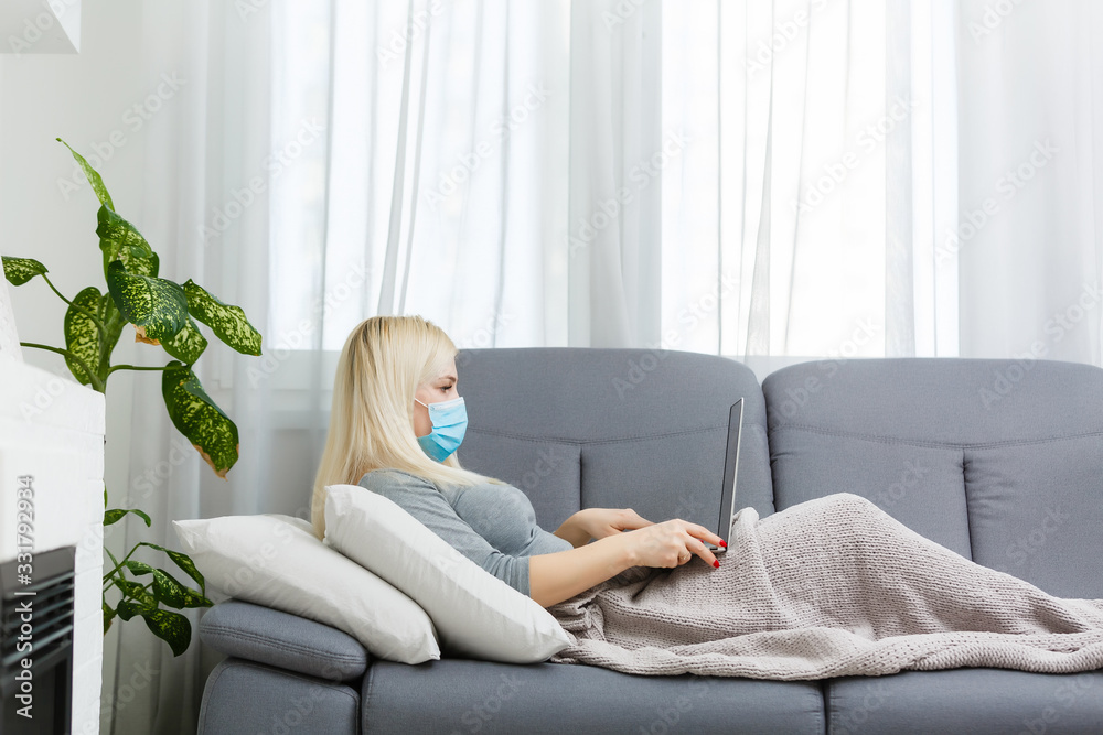 Coronavirus. Young business woman working from home wearing protective mask. Business woman in quarantine for coronavirus wearing protective mask. Working from home. Coronavirus. Young business woman working from home wearing protective mask. Business woman in quarantine for coronavirus wearing protective mask. Working from home.