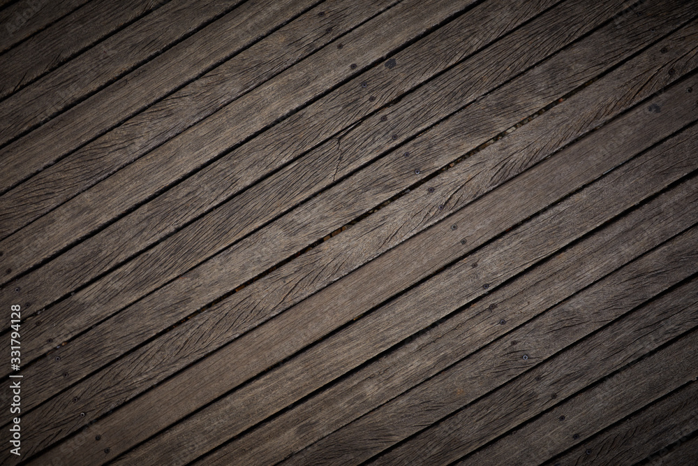 Wooden texture. Old terrace board. Background of old natural wooden dark empty deck with messy and grungy crack beech, oak tree floor texture inside vintage, retro perfect blank. Wooden texture. Old terrace board. Background of old natural wooden dark empty deck with messy and grungy crack beech, oak tree floor texture inside vintage, retro perfect blank.