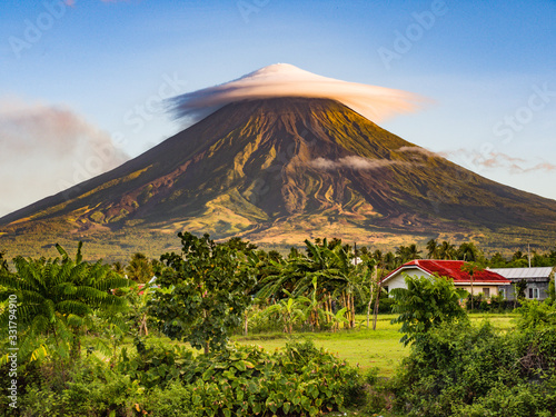 Mayon volcano -  massive, very active and perfect cone shape volcano in island of Luzon, Philippines photo