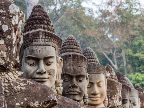 Angkor, heads between Angkor Wat and Angkor Thum, Cambodia