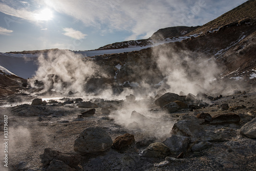 Sulfur steam from hot springs on the island of Iceland 