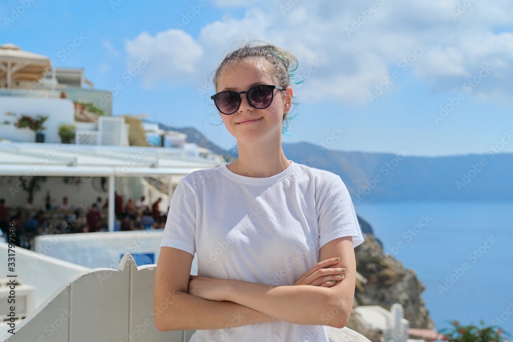 Teenager girl resting on Greek island Santorini