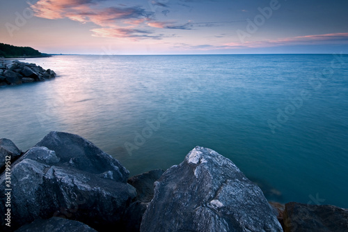 The Lake Michigan shoreline at dawn on a winter morning at Openlands Lakeshore Preserve.