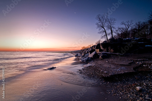 The Lake Michigan shoreline at dawn on a winter morning at Openlands Lakeshore Preserve.