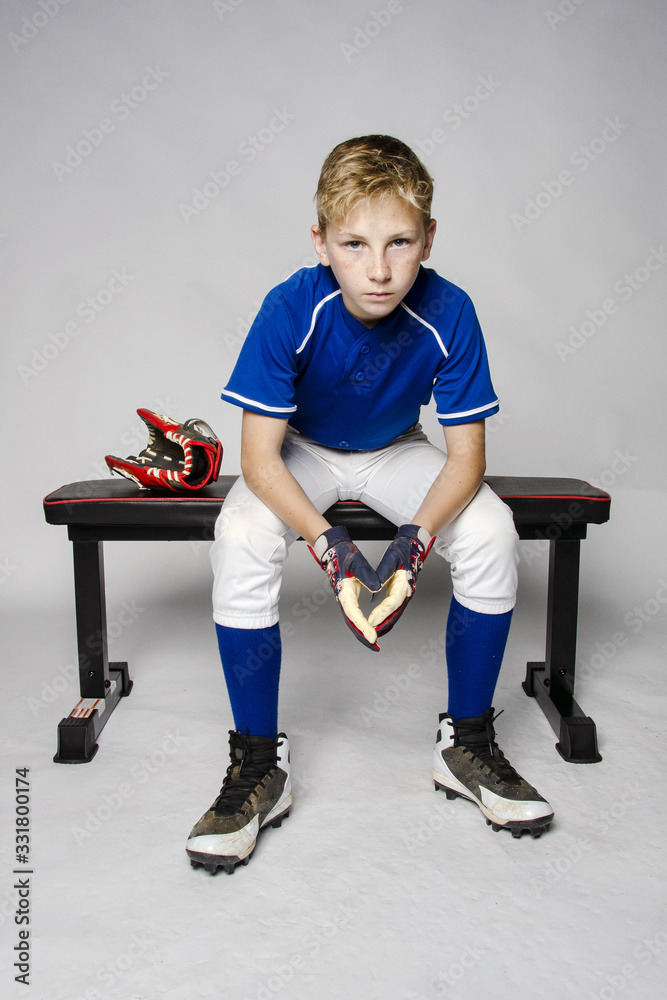 A baseball player resting on the bench., Stock Video - Envato Elements