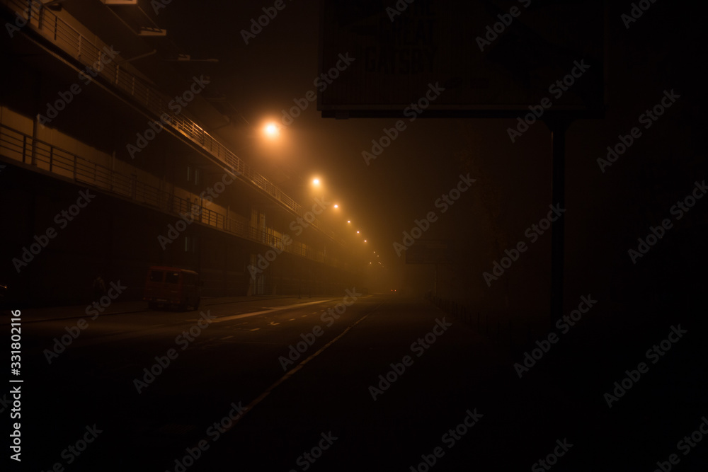 Highway at night in the fog in the city Highway at night in the fog in the city