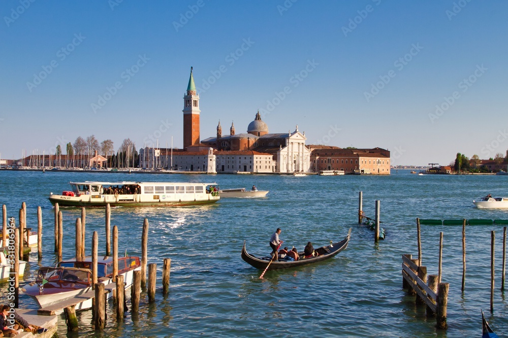 Fototapeta premium Traditional Venice Cityscape with narrow canal, gondola