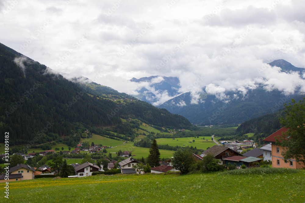Plakat view of valley in Gailtal Alps on a cloudy day, Austria