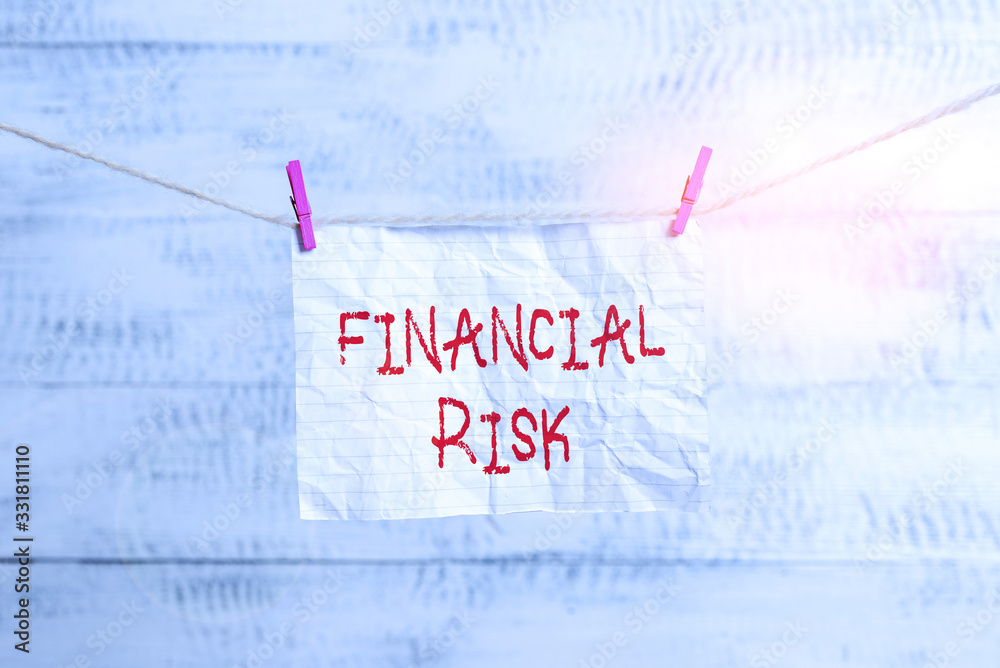 Obraz Handwriting text writing Financial Risk. Conceptual photo any of various types of risk associated with financing Clothesline clothespin rectangle shaped paper reminder white wood desk