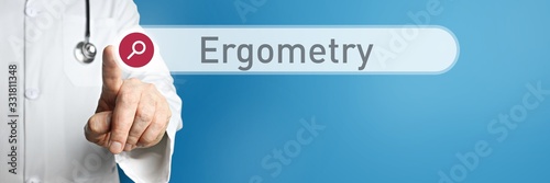 Ergometry. Doctor in smock points with his finger to a search box. The word Ergometry is in focus. Symbol for illness, health, medicine photo