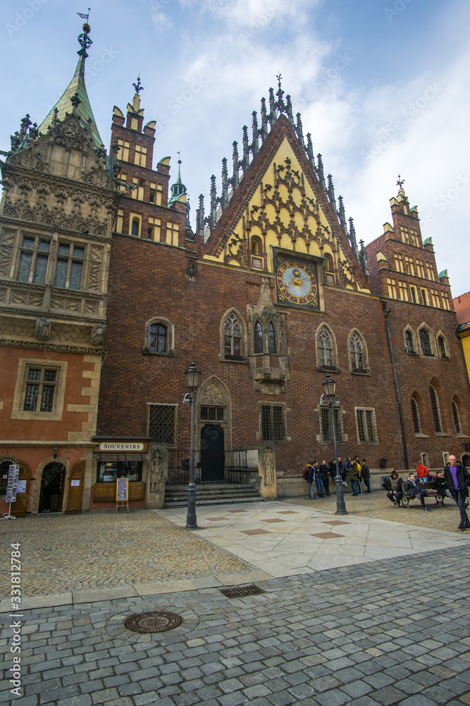 The Market Square in the city center of Wrocław city in Poland. in the picture you see the old colorful buildings and the Old town hall building 