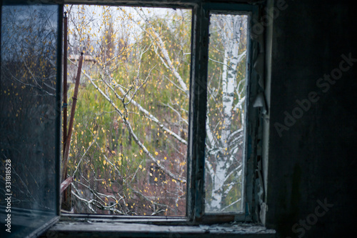 Old windows in the house in Pripyat in Chernobyl