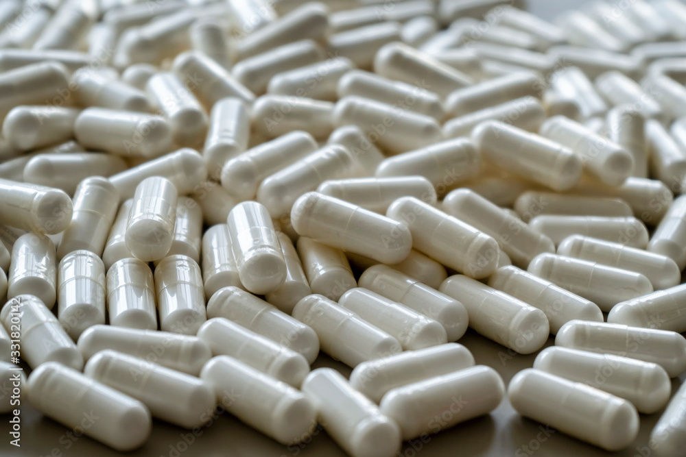 Pile of white medicinal pills