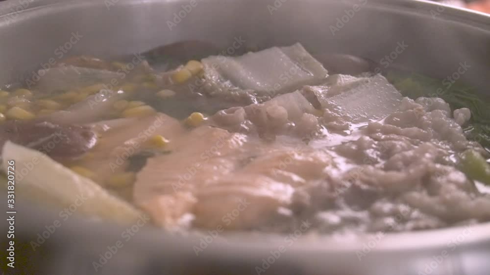 Japanese hot pot with salmon and pork meat. Japanese hot pot with salmon and pork meat.