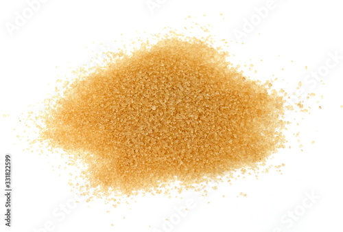 Closeup pile brown sugar isolated on white background.