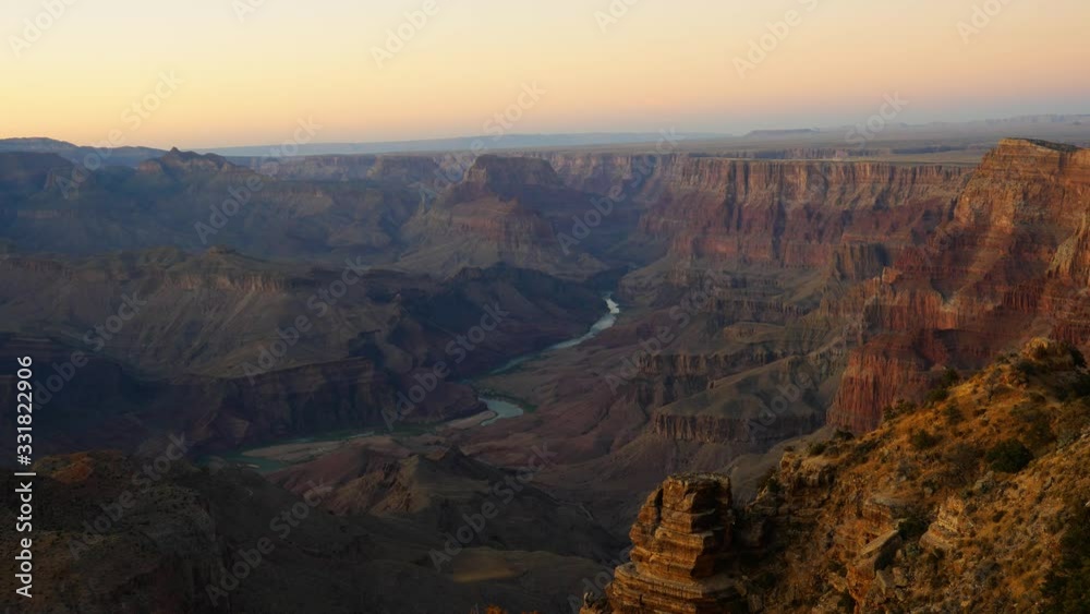 A Vibrant and Colorful Shot Looking Out Over the Beautiful Grand Canyon in Arizona from a Viewpoint in the Evening as the Sunsets A Vibrant and Colorful Shot Looking Out Over the Beautiful Grand Canyon in Arizona from a Viewpoint in the Evening as the Sunsets