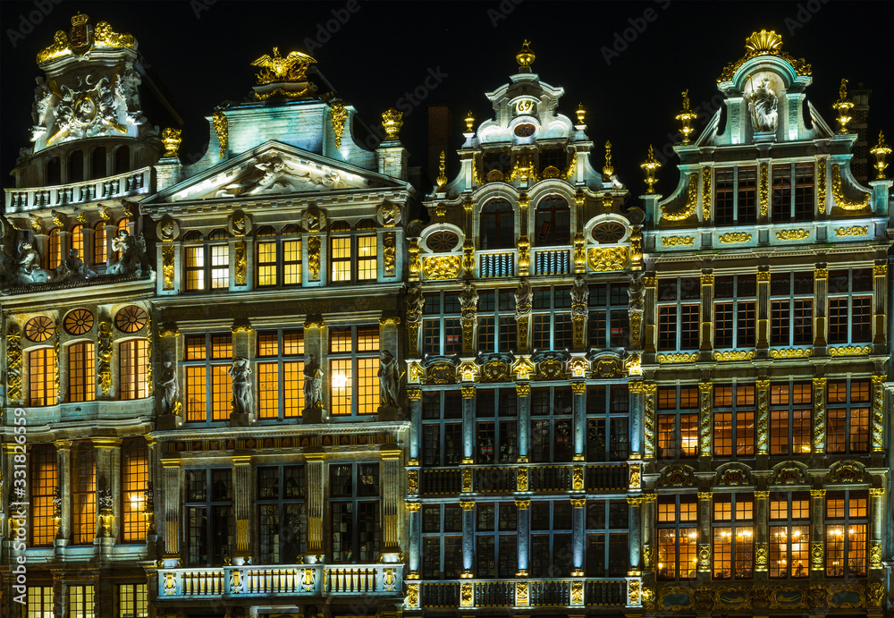 The traditional architecture of the Grand Place (Main Square) of Brussels City at night, Belgium.
