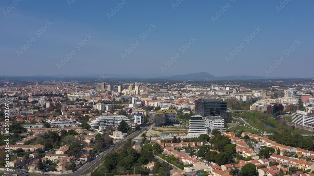 Montpellier aiguerelles neighborhood aerial sunny day France view over the city and pic saint loup mountain Montpellier aiguerelles neighborhood aerial sunny day France view over the city and pic saint loup mountain