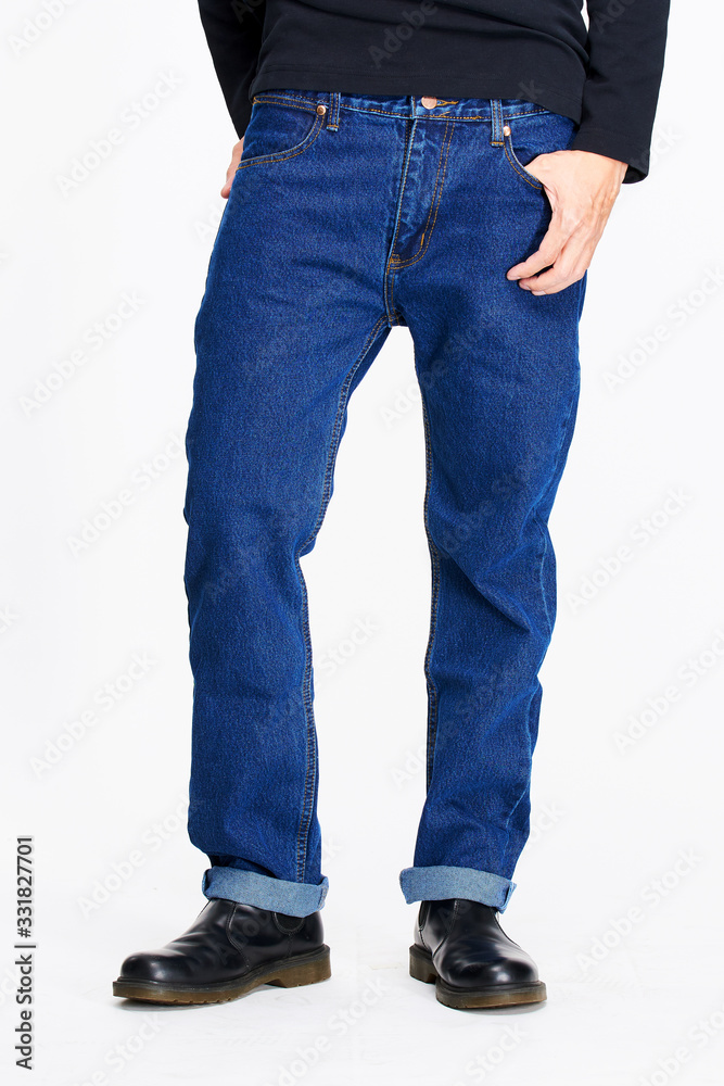 Male model in blue jeans bottom on white background. Male model in blue jeans bottom on white background.