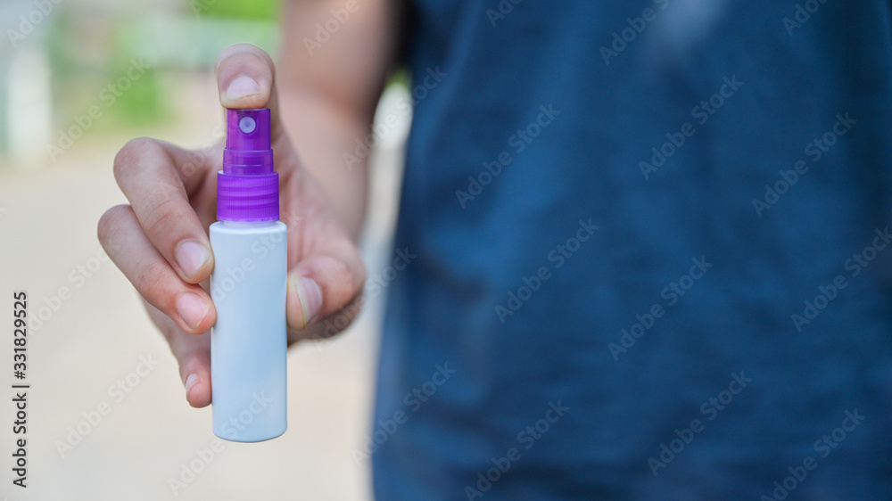 Spray alcohol on hand to clean, prevent infection with the corona virus or Covid 19. Spray alcohol on hand to clean, prevent infection with the corona virus or Covid 19.