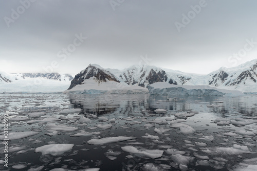 Brash Ice and landscape in Charlotte Bay, Antarctica