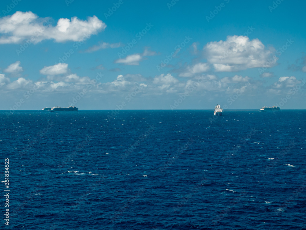 Bimini, Bahamas - March 19, 2020: cruise ships on quarantine at the ocean at sunny weather