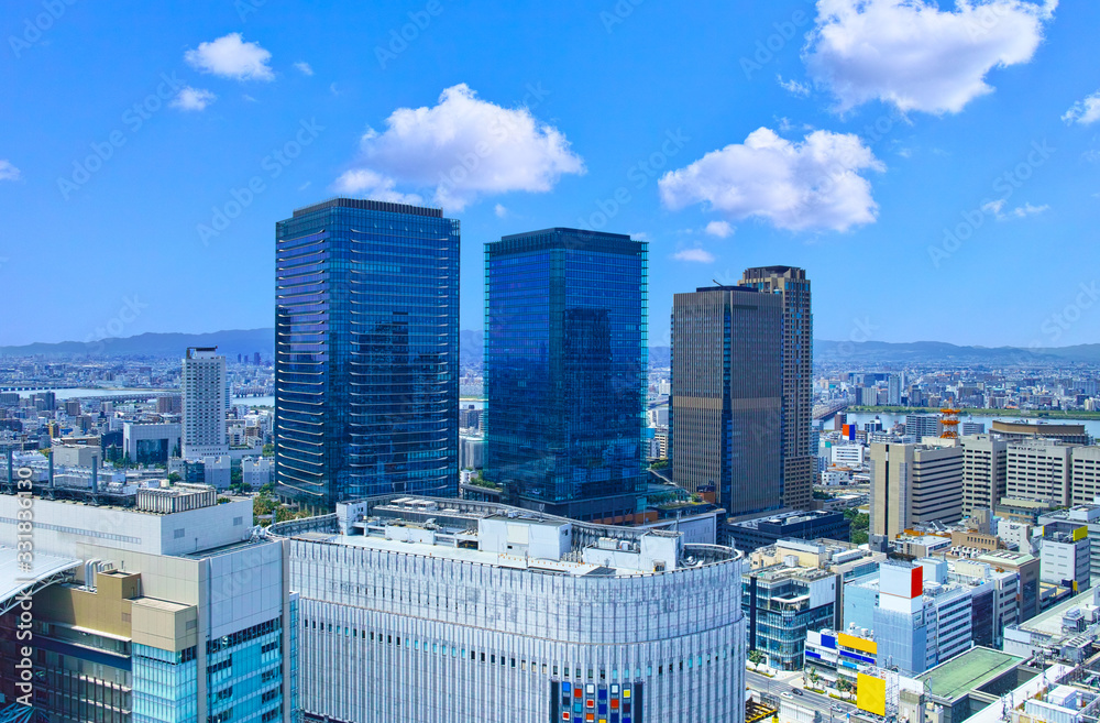 Naklejka premium 大阪府北区梅田にある大阪駅周辺の都市風景