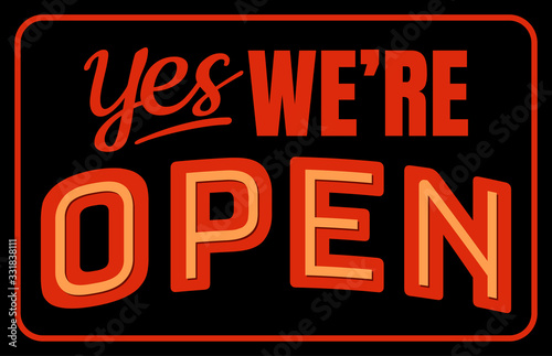 Yes we're open sign. Letter board isolated on black background