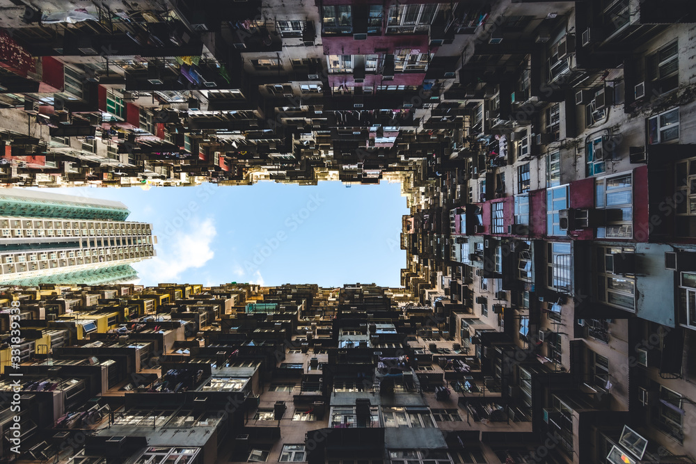 Dense and compart apartment building in Asia with symmetrical pattern ...