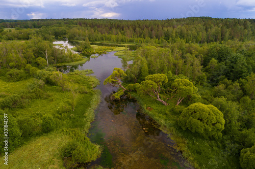 Above the Izvarka River on a cloudy July day  aerial photography . Izvara  Leningrad region. Russia