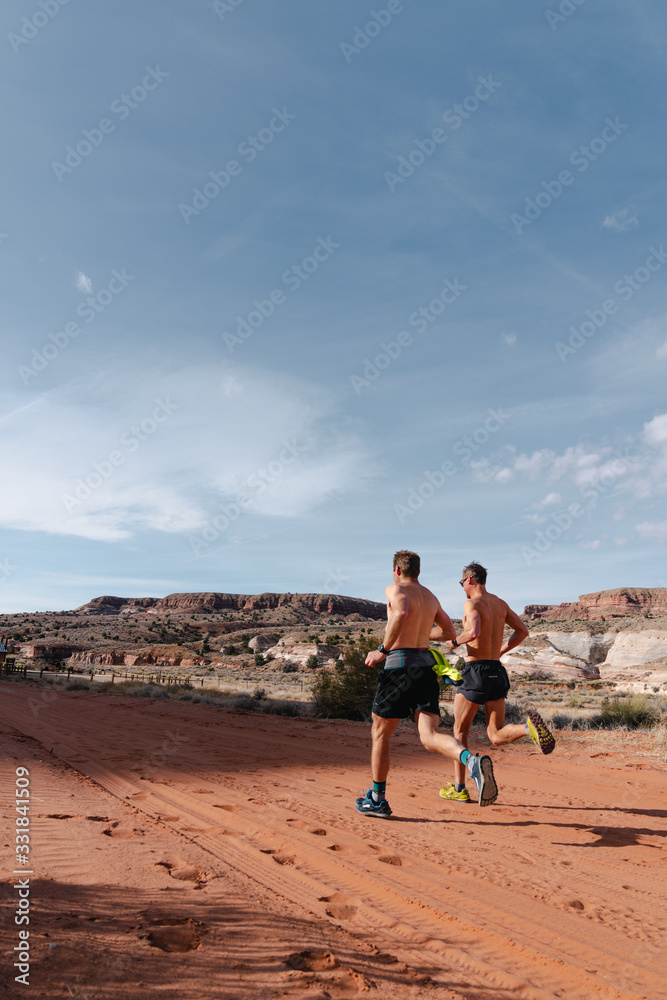Two Runners in the Desert