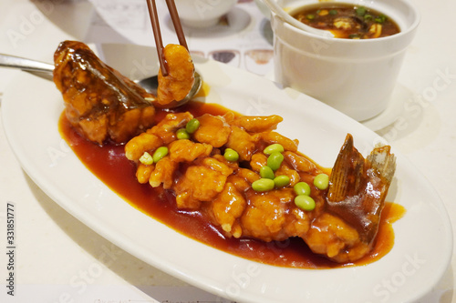 Song Shu fish or Squirrel Mandarin Fish, belongs to Huaiyang cuisine. The dish is named Squirrel Fish because of the way the dish is presented and resembles the fluffy tail of a squirrel.