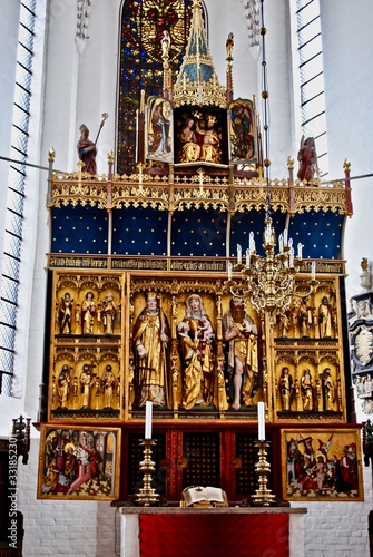 AARHUS, DENMARK: Aarhus Cathedral (Danish: Aarhus Domkirke) is a cathedral in Aarhus, Denmark. The cathedral's altar piece was carved by the famous Lubeck sculptor and painter Bernt Notke.  photo