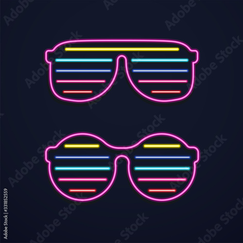 Bright neon glasses. Sunglasses or club glasses with light on dark background.
