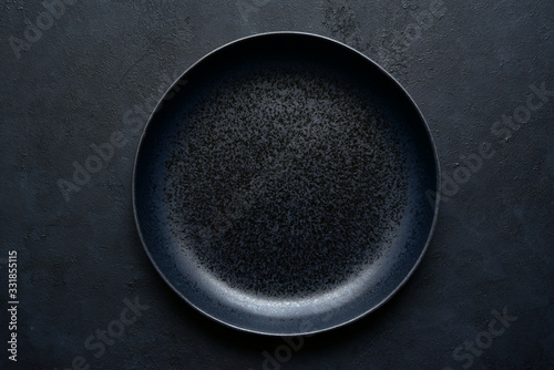 Canvas-taulu Culinary background with black empty plate