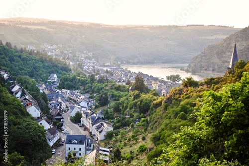 Hazy sunset view from Schönburg (Auf Schoenburg), a castle above the medieval town of Oberwesel in the UNESCO World Heritage site of the Upper Middle Rhine Valley, Rhineland-Palatinate, Germany. photo