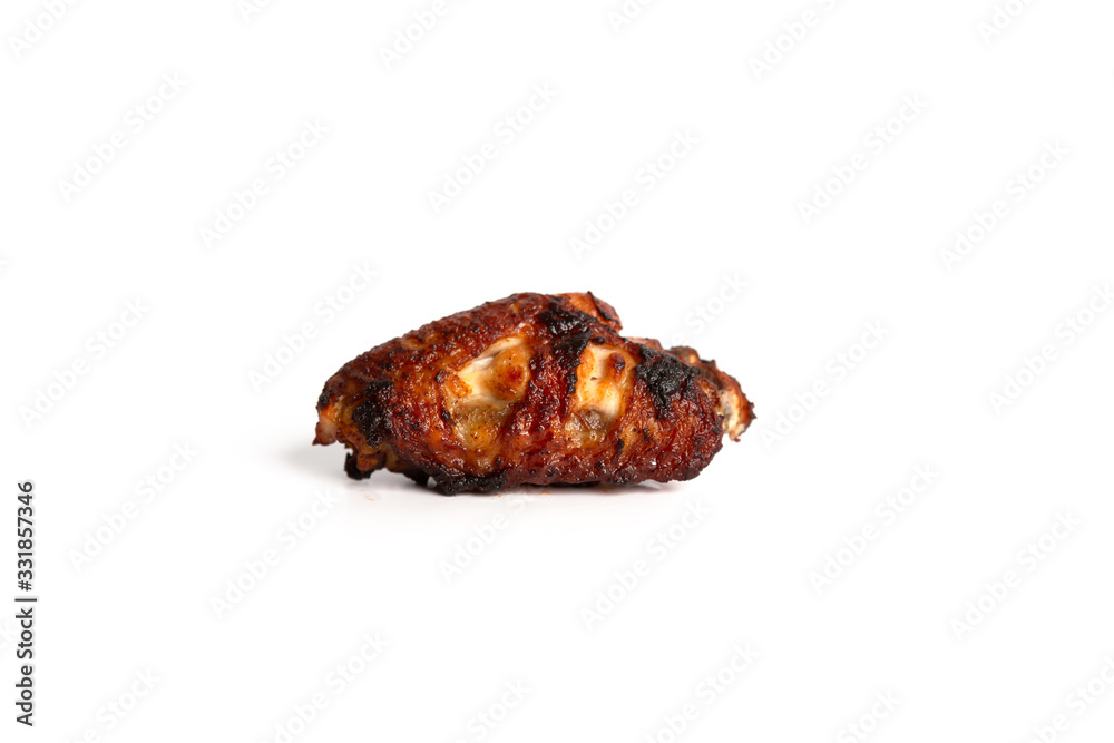 barbecue chicken wings close up on wooden tray shot with selective focus white background barbecue chicken wings close up on wooden tray shot with selective focus white background
