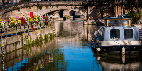 Small barge on the robine canal ,Narbonne,France.